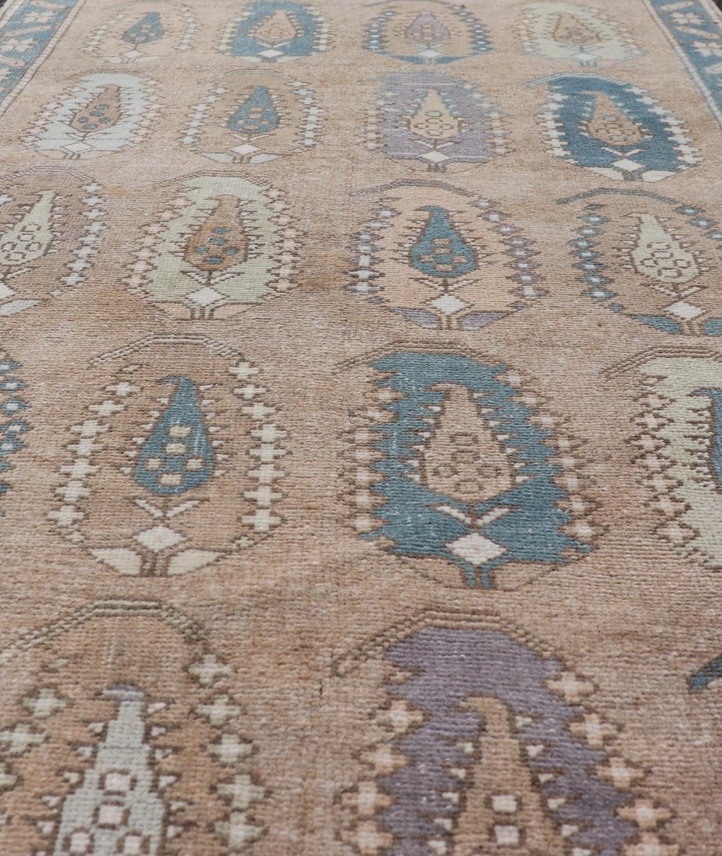 All - Over paisley Design Vintage Turkish Tulu, Keivan Woven Arts / rug TU - MTU - 4953, country of origin / type: Turkey / Oushak, circa 1940. Measures: 3'5 x 6'1 Vintage Turkish Tulu Rug with large Scale Paisley Design in Tans, Brown and Blue - Keivan Woven ArtsTU - MTU - 4953 - 18992Rug