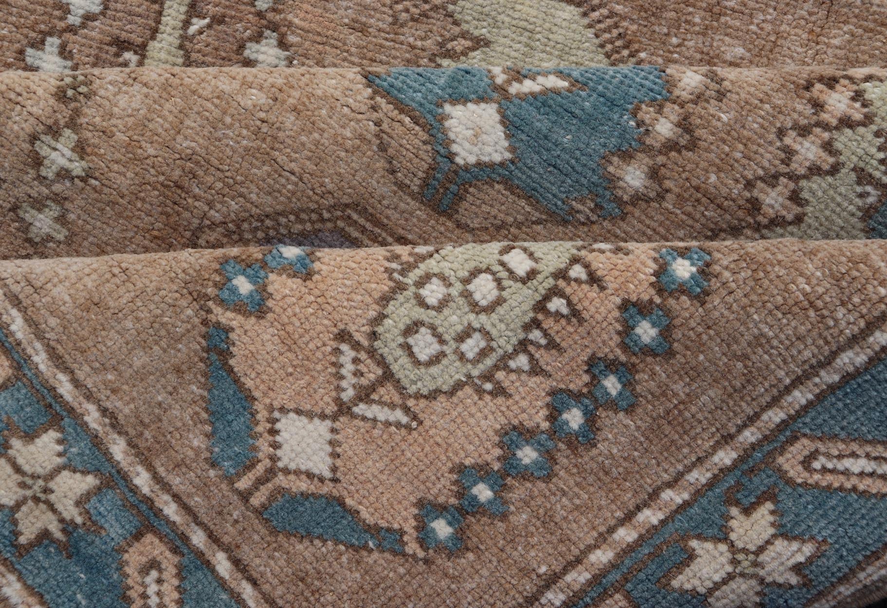All - Over paisley Design Vintage Turkish Tulu, Keivan Woven Arts / rug TU - MTU - 4953, country of origin / type: Turkey / Oushak, circa 1940. Measures: 3'5 x 6'1 Vintage Turkish Tulu Rug with large Scale Paisley Design in Tans, Brown and Blue - Keivan Woven ArtsTU - MTU - 4953 - 18992Rug