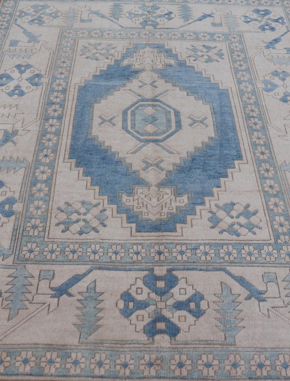 Vintage Turkish Oushak Rug With Medallion Design in Blue, Lt. Blue & Ivory Oushak vintage rug from Turkey with Geometric medallion in various blue tones, Light teal blue and ivory, Keivan Woven Arts/rug TU - MTU - 4954, country of origin / type: Tu... - Keivan Woven ArtsTU - MTU - 4954 - 18998Rug