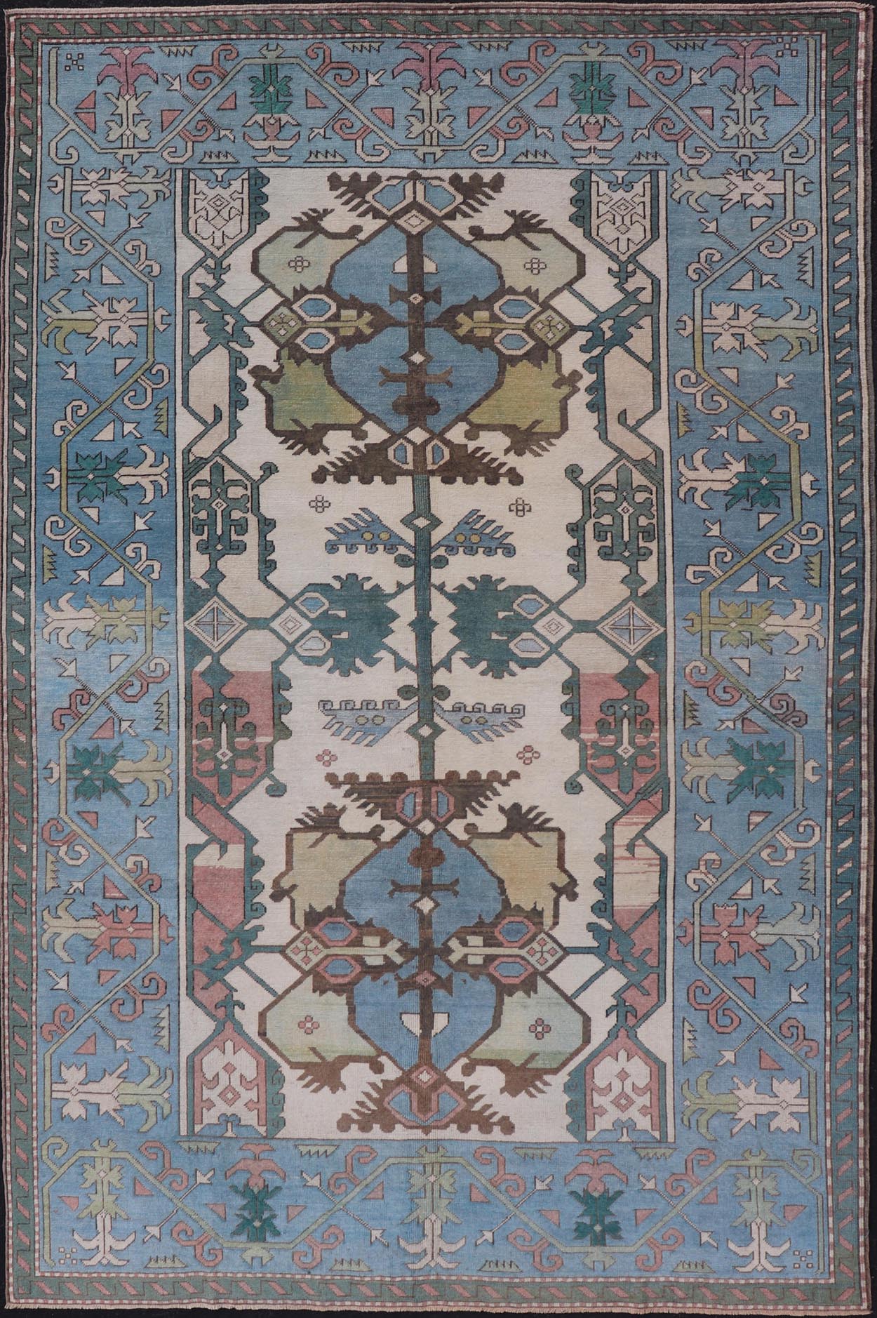 Unique Turkish Rug with Bold Florals in Lt, blue, Lt, Green, Teal & Pink Unusual and Unique Turkish Rug with Bold Florals in Lt, blue, Lt, Green, Teal & Pink, ivory. Keivan Woven Arts rug/TU - MTU - 4960. Set on Ivory background and light blue borde... - Keivan Woven ArtsTU - MTU - 4960 - 19010