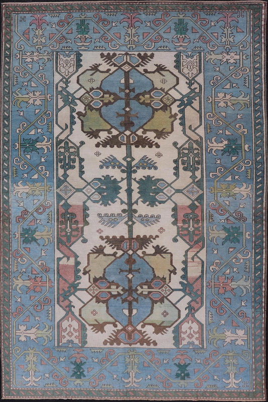 Unique Turkish Rug with Bold Florals in Lt, blue, Lt, Green, Teal & Pink Unusual and Unique Turkish Rug with Bold Florals in Lt, blue, Lt, Green, Teal & Pink, ivory. Keivan Woven Arts rug/TU - MTU - 4960. Set on Ivory background and light blue borde... - Keivan Woven ArtsTU - MTU - 4960 - 19010