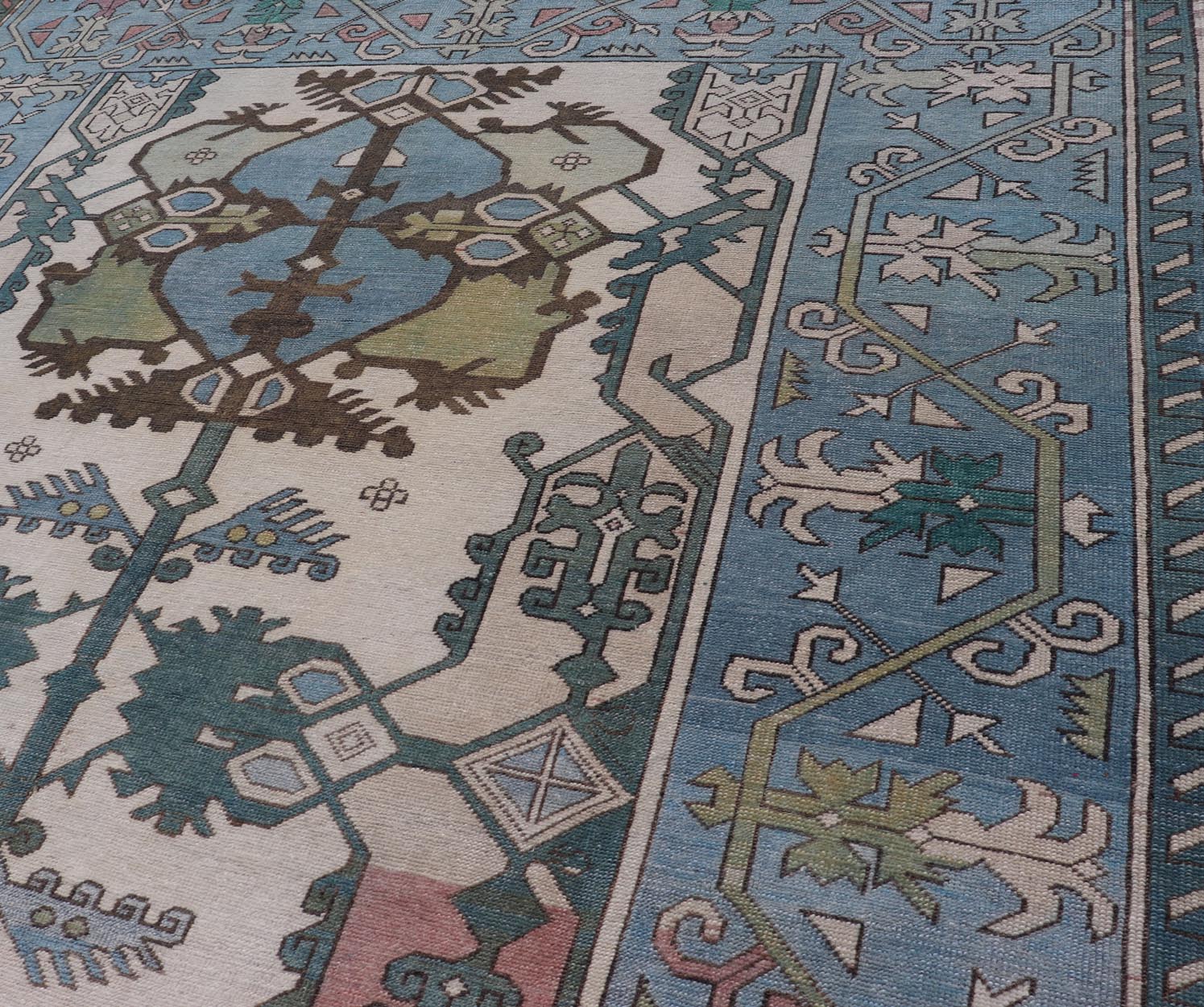 Unique Turkish Rug with Bold Florals in Lt, blue, Lt, Green, Teal & Pink Unusual and Unique Turkish Rug with Bold Florals in Lt, blue, Lt, Green, Teal & Pink, ivory. Keivan Woven Arts rug/TU - MTU - 4960. Set on Ivory background and light blue borde... - Keivan Woven ArtsTU - MTU - 4960 - 19010