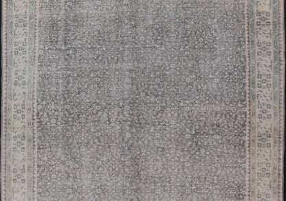 Vintage Hand - Knotted Distressed Turkish Rug in Wool with All - Over Floral Pattern This vintage Turkish Oushak rug has been hand - knotted in wool and features an all - over sub - geometric distressed floral design rendered in cream, blue, green and ivo... - Keivan Woven ArtsTU - MTU - 4962 - 19172