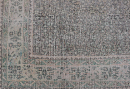 Vintage Hand - Knotted Distressed Turkish Rug in Wool with All - Over Floral Pattern This vintage Turkish Oushak rug has been hand - knotted in wool and features an all - over sub - geometric distressed floral design rendered in cream, blue, green and ivo... - Keivan Woven ArtsTU - MTU - 4962 - 19172