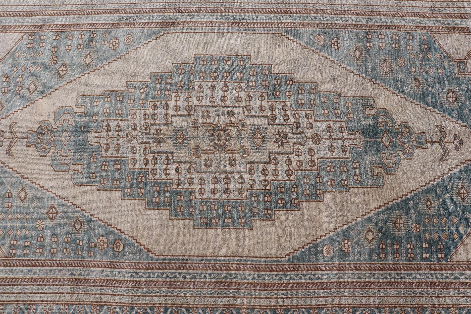 Vintage Oushak Rug in Muted Taupe, Soft Blue, Tan, and Light Brown Vintage Oushak rug in muted taupe, tan, and light brown, and light blue Turkish Oushak rug with taupe and blue. Keivan Woven Arts / rug TU - MTU - 4963 country of origin / type: Turk... - Keivan Woven ArtsTU - MTU - 4963 - 19022Rug