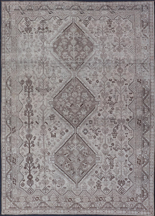 Persian Shiraz rug with vertical sub - geometric medallions in earth tones. rug TU - MTU - 4970, country of origin / type: Iran / Shiraz, circa 1920 Keivan Woven Arts Measures: 7'0 x 10'0 - Keivan Woven ArtsTU - MTU - 4970 - 19214Rug