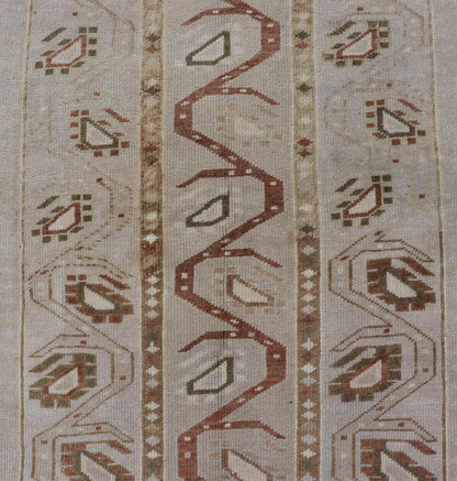 Measures: 3'5 x 6'2 This one - of - a - kind Turkish Oushak has a light taupe colored background reaching the field and the border. The unique tribal designs within the field are rendered in brick red, brown, and forest green. The complimentary borde... - Keivan Woven ArtsTU - MTU - 6003 - 19034