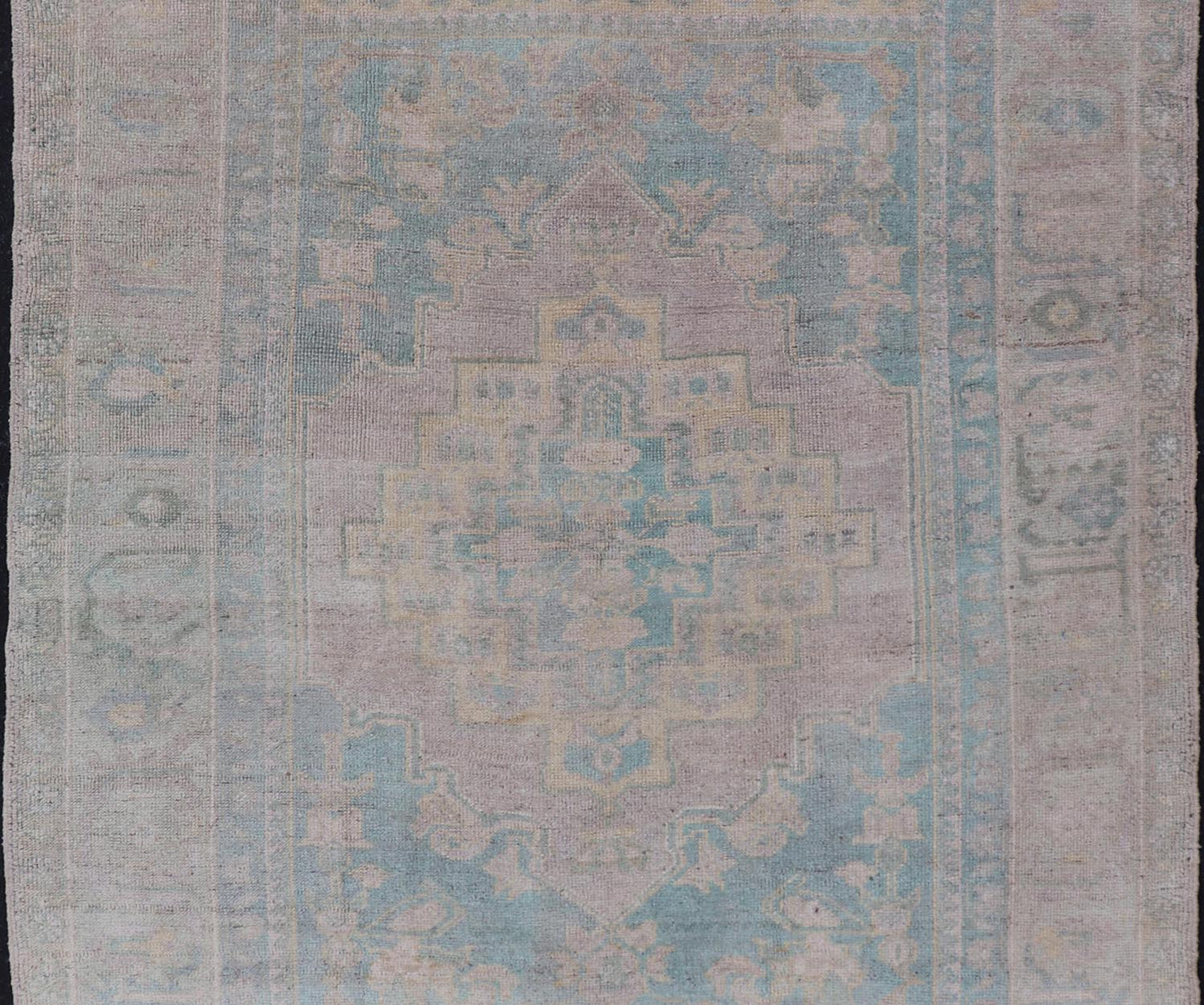 Light Colored Turkish Vintage Oushak Rug with Medallion Design Measures: 4'10 x 7'0 This vintage Turkish Oushak features a large central medallion and a complimentary stylized border. The charming palette consists of muted shades of bl... - Keivan Woven ArtsTU - MTU - 6006 - 19040Rug