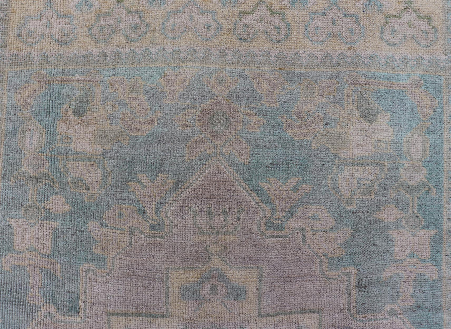 Light Colored Turkish Vintage Oushak Rug with Medallion Design Measures: 4'10 x 7'0 This vintage Turkish Oushak features a large central medallion and a complimentary stylized border. The charming palette consists of muted shades of bl... - Keivan Woven ArtsTU - MTU - 6006 - 19040Rug