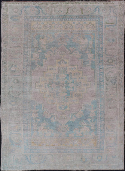 Light Colored Turkish Vintage Oushak Rug with Medallion Design Measures: 4'10 x 7'0 This vintage Turkish Oushak features a large central medallion and a complimentary stylized border. The charming palette consists of muted shades of bl... - Keivan Woven ArtsTU - MTU - 6006 - 19040Rug