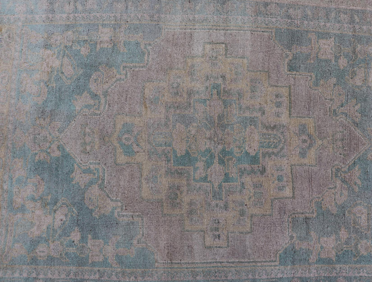 Light Colored Turkish Vintage Oushak Rug with Medallion Design Measures: 4'10 x 7'0 This vintage Turkish Oushak features a large central medallion and a complimentary stylized border. The charming palette consists of muted shades of bl... - Keivan Woven ArtsTU - MTU - 6006 - 19040Rug