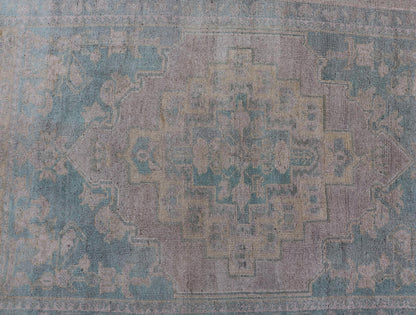 Light Colored Turkish Vintage Oushak Rug with Medallion Design Measures: 4'10 x 7'0 This vintage Turkish Oushak features a large central medallion and a complimentary stylized border. The charming palette consists of muted shades of bl... - Keivan Woven ArtsTU - MTU - 6006 - 19040Rug