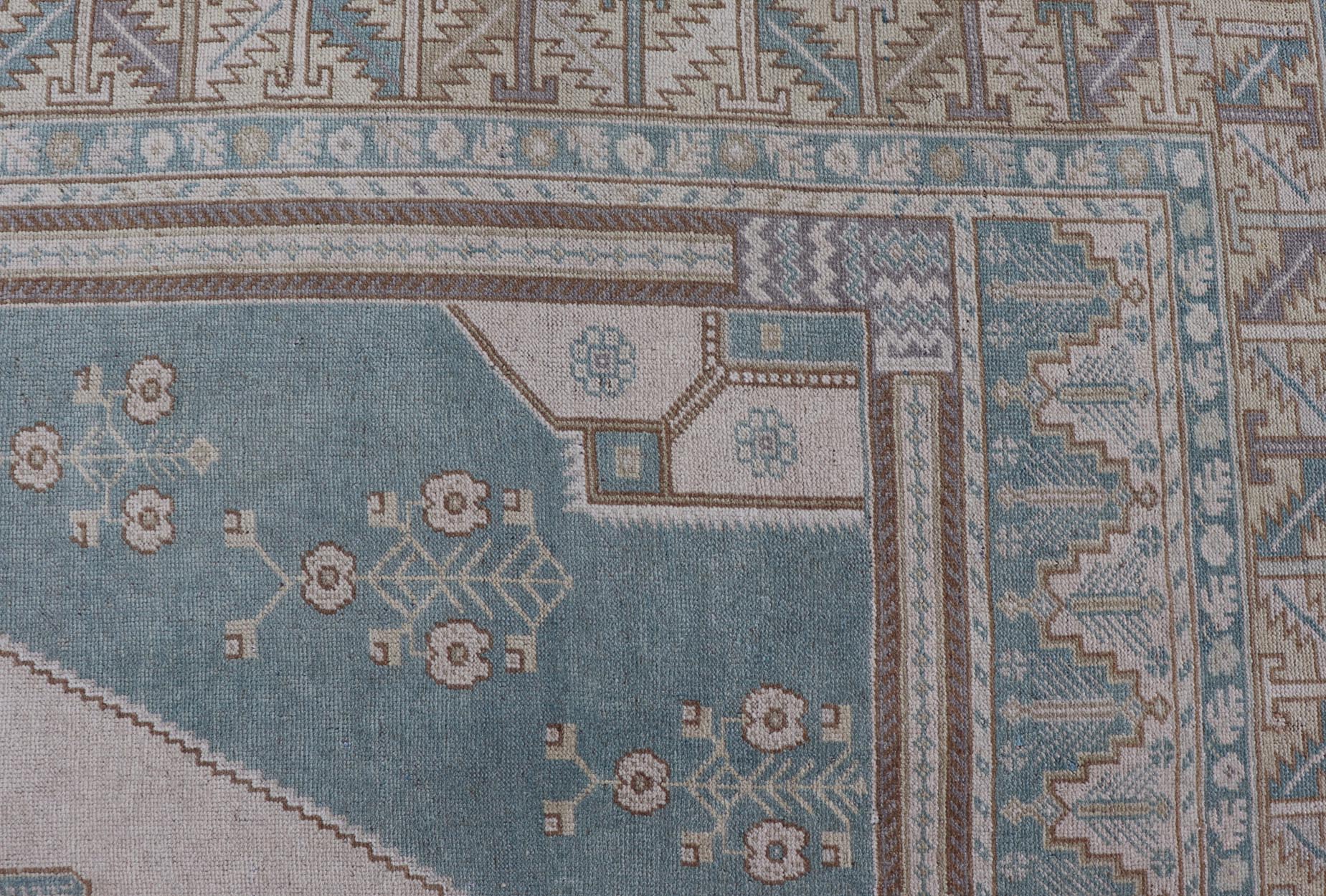 Large Vintage Turkish Oushak Rug with Central Medallion in Blue and Cream Faded vintage Turkish Oushak rug with Central Medallion in cream and blue, rug TU - MTU - 6011, country of origin / type: Turkey / Oushak, circa 1940 This sublime a... - Keivan Woven ArtsTU - MTU - 6011 - 19220Rug