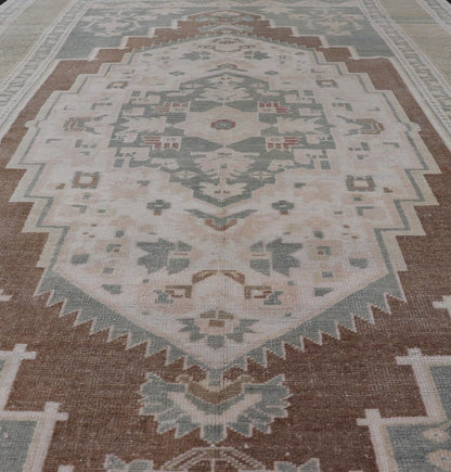 vintage Turkish Oushak with Medallion in Taupe, Lt. Brown, Gray Blue, & Tan Vintage Turkish Oushak Medallion rug in Gray blue, light brown, gray green, taupe, tan and cream Keivan Woven Arts rug/TU - MTU - 6074, country of origin / type: Turkey / O... - Keivan Woven ArtsTU - MTU - 6074 - 19196Rug