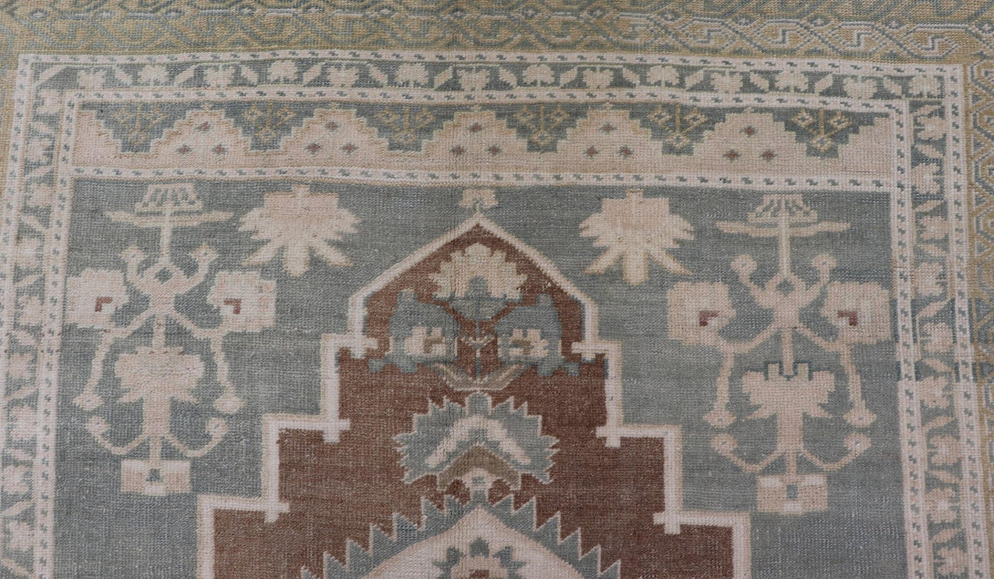 vintage Turkish Oushak with Medallion in Taupe, Lt. Brown, Gray Blue, & Tan Vintage Turkish Oushak Medallion rug in Gray blue, light brown, gray green, taupe, tan and cream Keivan Woven Arts rug/TU - MTU - 6074, country of origin / type: Turkey / O... - Keivan Woven ArtsTU - MTU - 6074 - 19196Rug