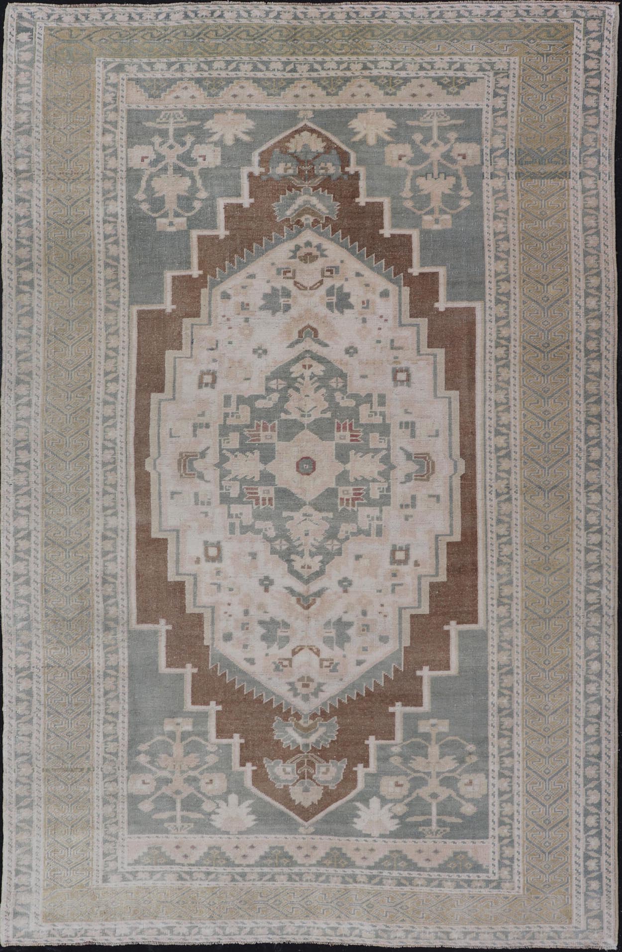 vintage Turkish Oushak with Medallion in Taupe, Lt. Brown, Gray Blue, & Tan Vintage Turkish Oushak Medallion rug in Gray blue, light brown, gray green, taupe, tan and cream Keivan Woven Arts rug/TU - MTU - 6074, country of origin / type: Turkey / O... - Keivan Woven ArtsTU - MTU - 6074 - 19196Rug
