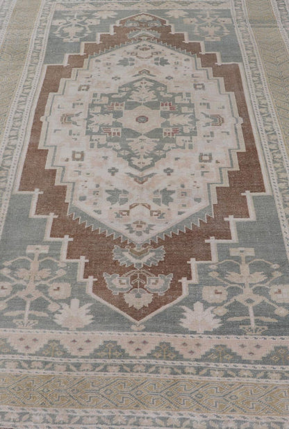 vintage Turkish Oushak with Medallion in Taupe, Lt. Brown, Gray Blue, & Tan Vintage Turkish Oushak Medallion rug in Gray blue, light brown, gray green, taupe, tan and cream Keivan Woven Arts rug/TU - MTU - 6074, country of origin / type: Turkey / O... - Keivan Woven ArtsTU - MTU - 6074 - 19196Rug