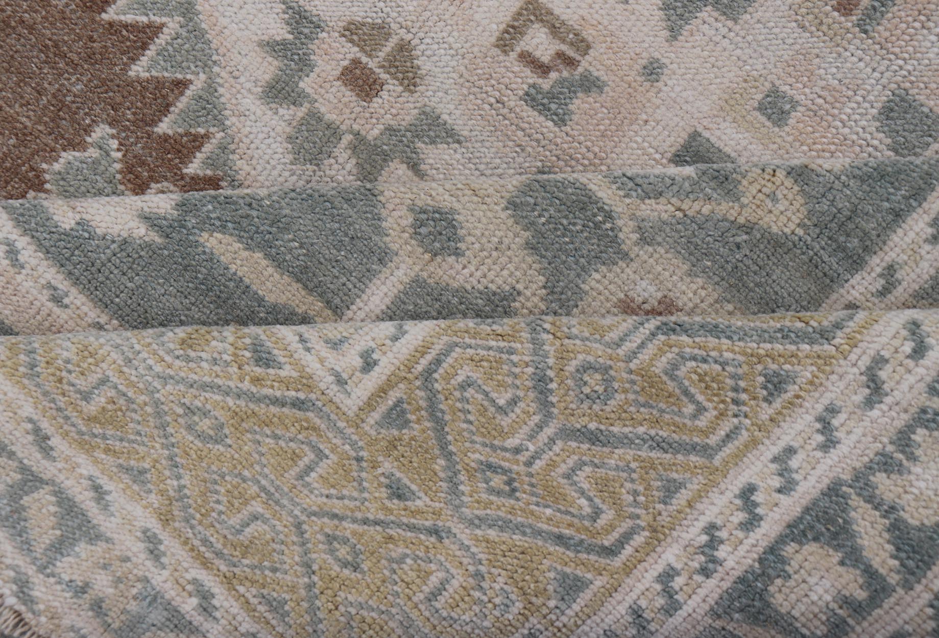 vintage Turkish Oushak with Medallion in Taupe, Lt. Brown, Gray Blue, & Tan Vintage Turkish Oushak Medallion rug in Gray blue, light brown, gray green, taupe, tan and cream Keivan Woven Arts rug/TU - MTU - 6074, country of origin / type: Turkey / O... - Keivan Woven ArtsTU - MTU - 6074 - 19196Rug