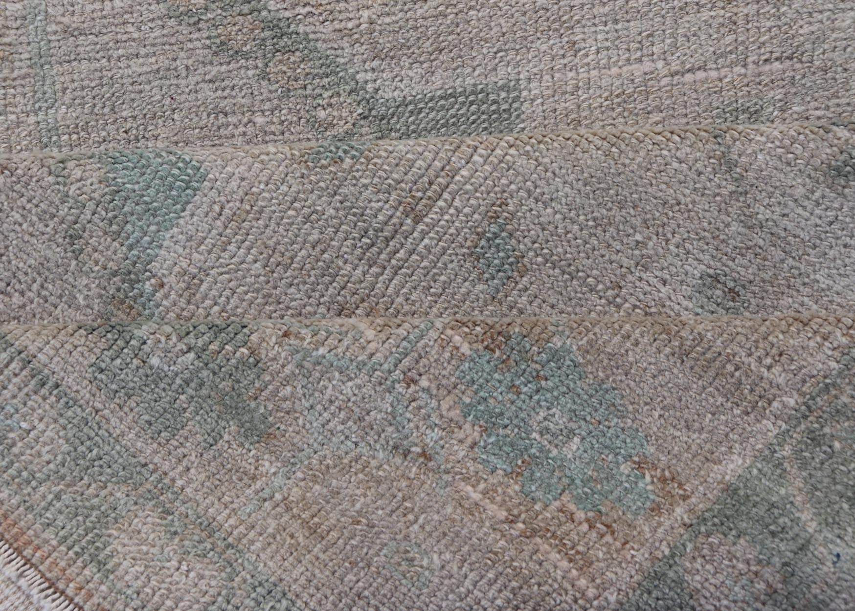 Vintage Turkish short Oushak Runner with Subdued Geometric Medallions in Light Tones Vintage small Oushak carpet with multi - medallion design in cream, tan, and light teal green, teal blue. Keivan Woven Arts rug/TU - MTU - 6103, country of origin / ... - Keivan Woven ArtsTU - MTU - 6103 - 19052Rug