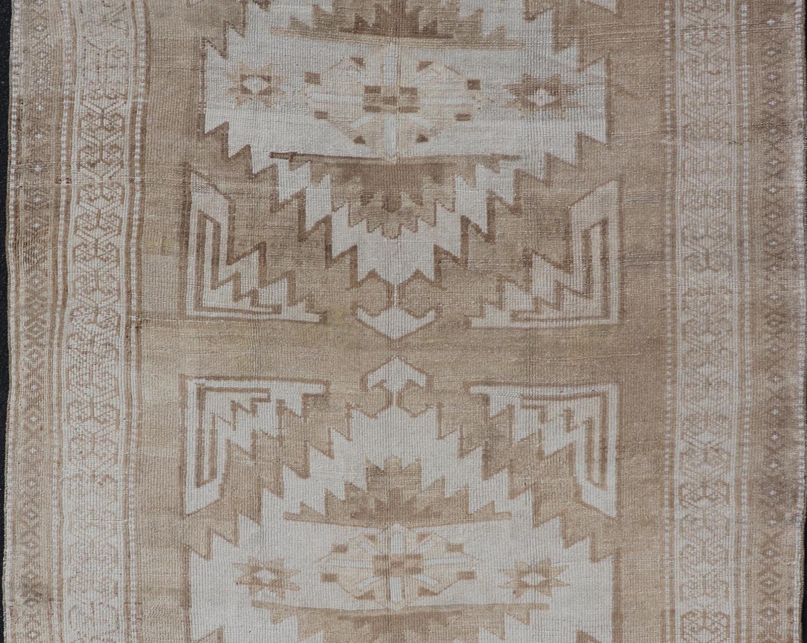 Vintage Hand Knotted Turkish Oushak Kars in Muted Tones & Neutral Colors Turkish Kars/Oushak rug possesses two medallions with overall Sub - geometric design paired with Delicate colors and muted tones. circa/1940 Keivan Woven Arts / rug/ TU - MTU - 6... - Keivan Woven ArtsTU - MTU - 65 - 18734Rug