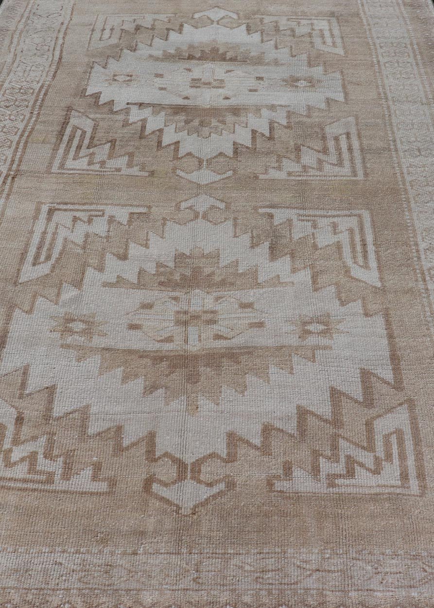 Vintage Hand Knotted Turkish Oushak Kars in Muted Tones & Neutral Colors Turkish Kars/Oushak rug possesses two medallions with overall Sub - geometric design paired with Delicate colors and muted tones. circa/1940 Keivan Woven Arts / rug/ TU - MTU - 6... - Keivan Woven ArtsTU - MTU - 65 - 18734Rug