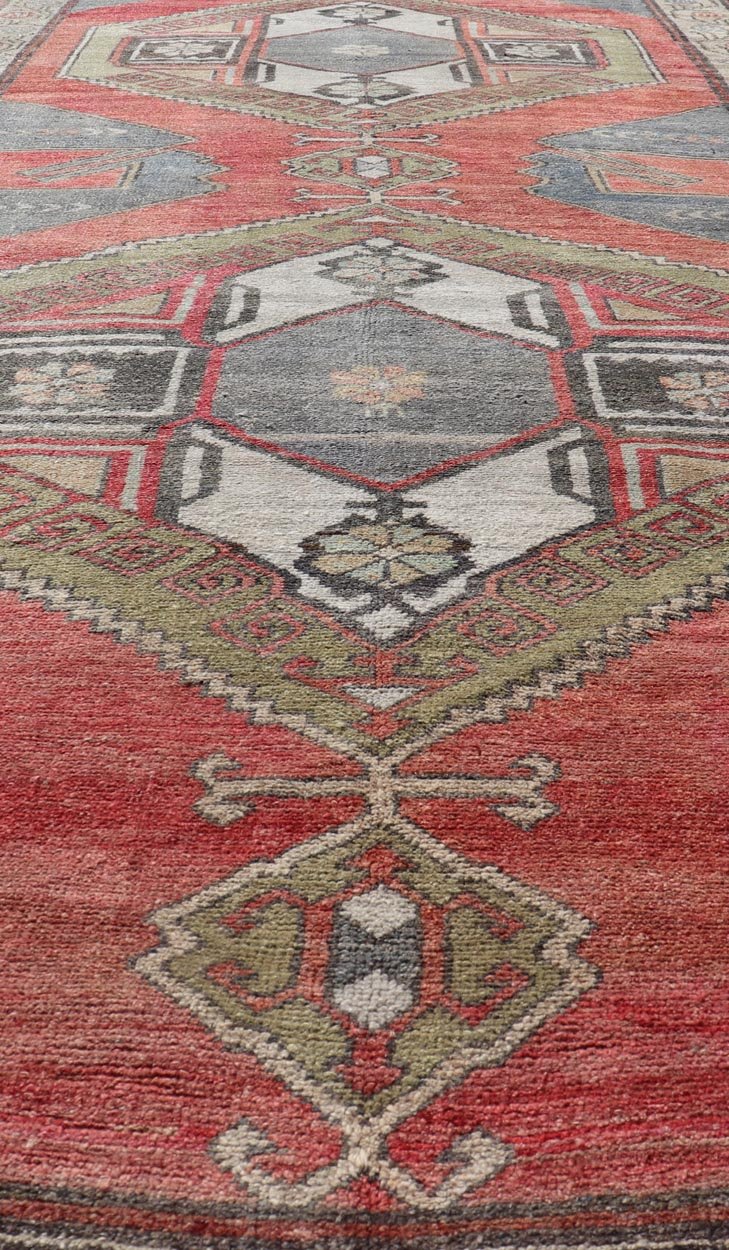 Red Field Vintage Turkish Oushak Gallery Runner with A Geometric Design Red field vintage Turkish Oushak rug with vertical geometric medallions, Keivan Woven Arts / rug TU - MTU - 8 , country of origin / type: Turkey / Oushak, circa 1940 ... - Keivan Woven ArtsTU - MTU - 8 - 18637Rug