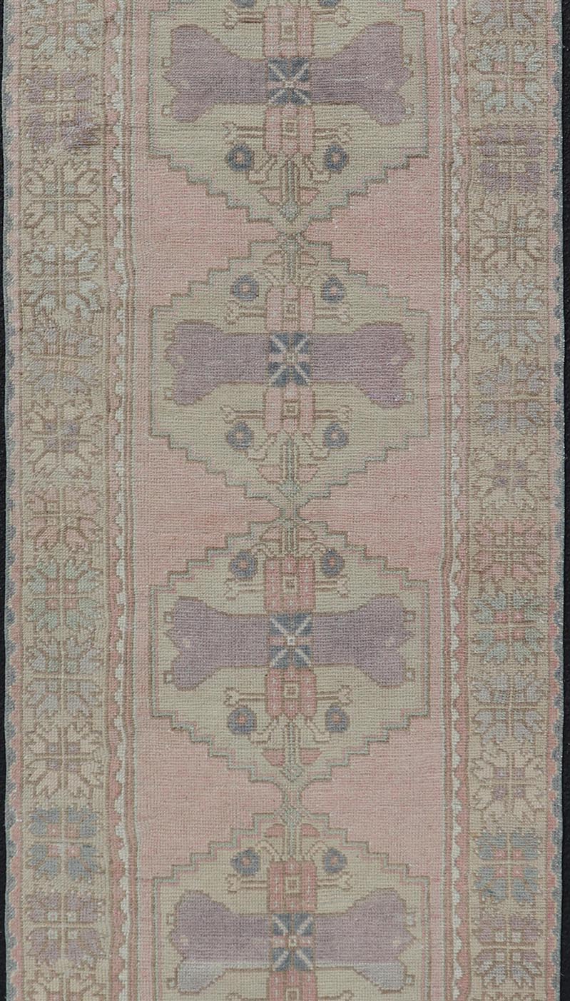 Measures: 2'11 x 8'9 Turkish Vintage Oushak Runner with Medallion's in Pink, Gray, and Light Yellow. Country of Origin: Turkey; Type: Oushak; Design: Medallion, Sub - Geometric, Tribal Medallion; Keivan Woven Arts: rug TU - MTU - 913; mid - 20th century ... - Keivan Woven ArtsTU - MTU - 913 - 21967Rug