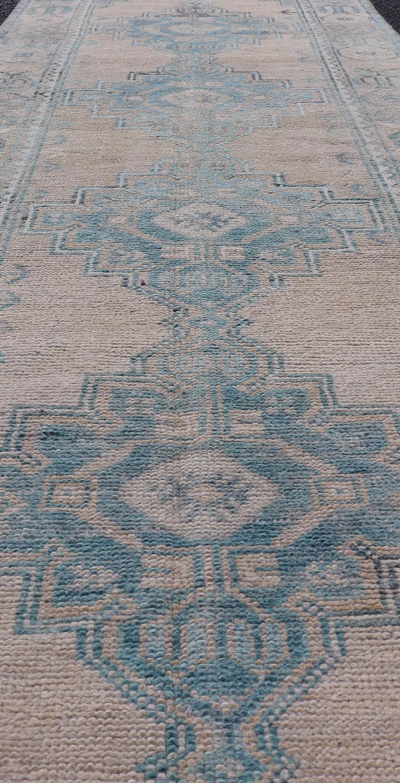 Turkish Vintage Oushak Runner with Geometric Medallion Design in Blues and Beige Measures: 2'9 x 9'9 Turkish Vintage Oushak Runner with Geometric Medallion Design in Blues and Beige. Keivan Woven Arts / rug TU - MTU - 926, country of origin / type:... - Keivan Woven ArtsTU - MTU - 926 - 21979Rug