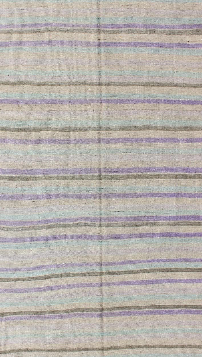 Vintage Turkish Kilim with Stripes in Light green, Pastel Purple, Cream and Taupe rug/tu - mtu - 95040 origin/turkey This vintage Kilim carpet from Mid - Century Turkey features a stripe pattern set atop an grey background. Colors include grey, taupe... - Keivan Woven ArtsTU - MTU - 95040 - 3704Rug