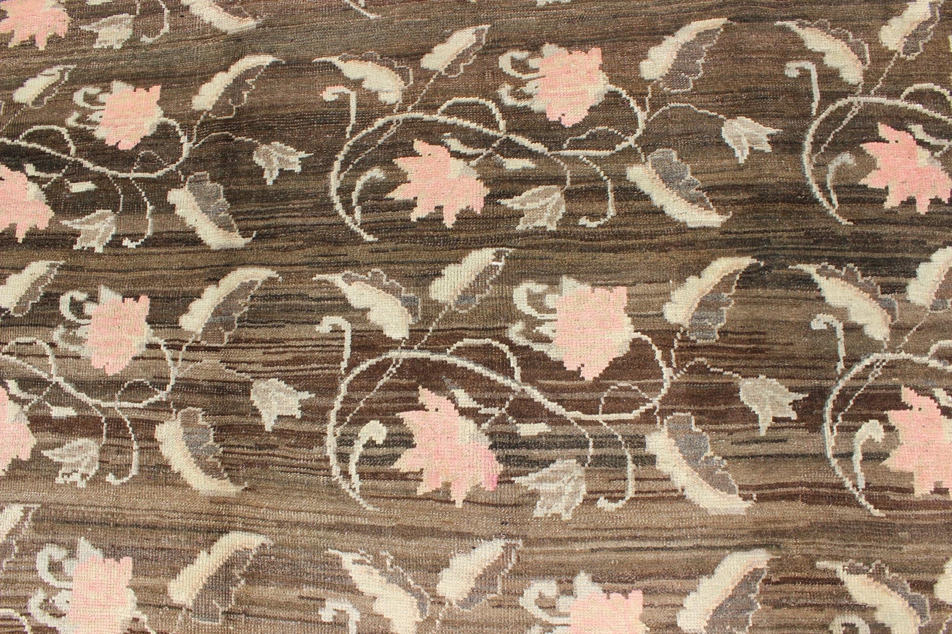 Vintage Kars Rug from Eastern Turkey with Rose Design Brown, Green, and Pink Measures: 7'5 x 11'4 Set on a dark greenish - brown background, the all - encompassing floral pattern of this vintage Turkish Kars is unique. The pale pink and pea... - Keivan Woven ArtsTU - MTU - 95044 - 3904Rug