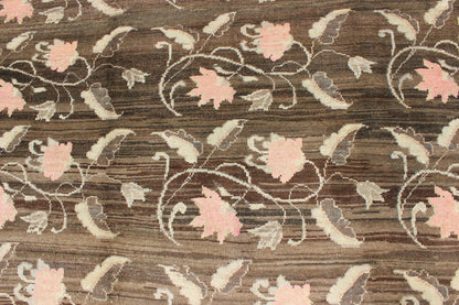 Vintage Kars Rug from Eastern Turkey with Rose Design Brown, Green, and Pink Measures: 7'5 x 11'4 Set on a dark greenish - brown background, the all - encompassing floral pattern of this vintage Turkish Kars is unique. The pale pink and pea... - Keivan Woven ArtsTU - MTU - 95044 - 3904Rug