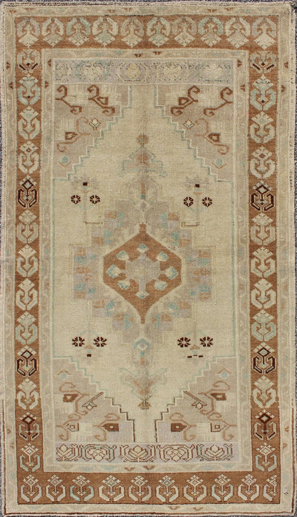 Center Medallion Vintage Turkish Oushak Rug in Brown, Taupe, Ivory, Gray, rug mtu - 95051, country of origin / type: Turkey / Oushak, circa mid - 20th century This vintage Turkish Oushak rug (circa mid - 20th century) features a unique blend of colors... - Keivan Woven ArtsTU - MTU - 95051 - 3688Rug