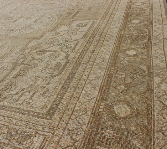 Large Vintage Turkish Floral Medallion Oushak Rug in All Neutral Palette Measures: 7'3 x 13' This muted Turkish Oushak features a light khaki border and background with shades of beige. The corners and central medallion are composed of a... - Keivan Woven ArtsTU - MTU - 95085 - 3692Rug