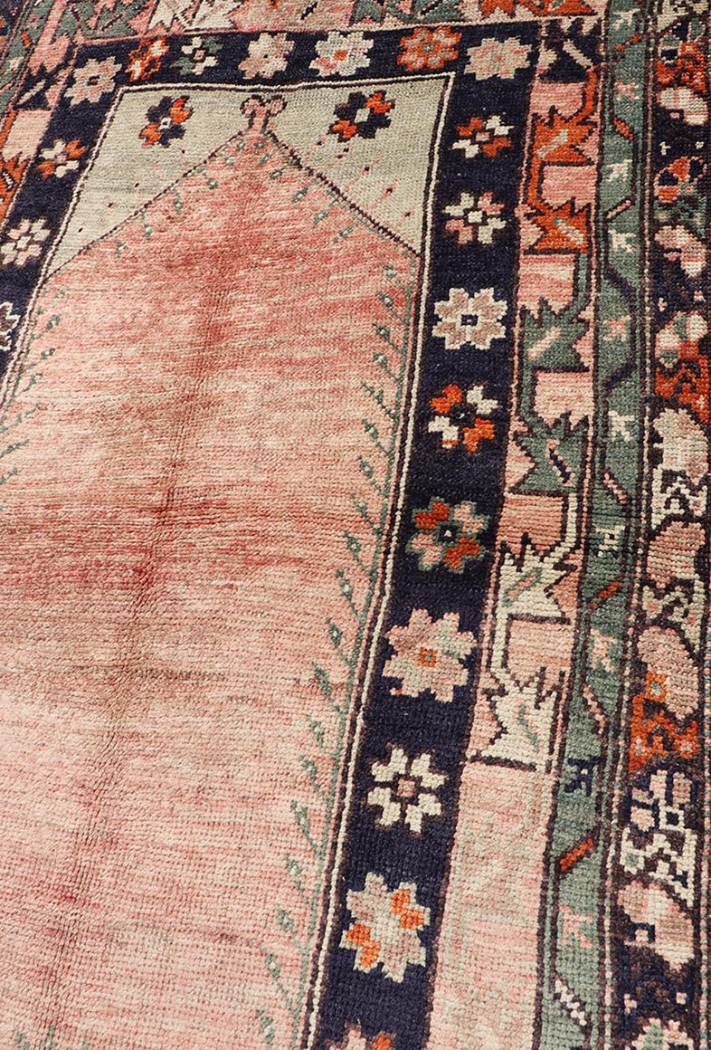 Keivan Woven Arts - Turkish Oushak Vintage Rug with Geometric design in shades of peach, navy blue and green. rug TU - MTU - 95086, country of origin / type: Turkey / Oushak, circa mid - 20th century Measures: 3'8 x 6'2 This Oushak rug features a unique... - Keivan Woven ArtsTU - MTU - 95086 - 3698Rug