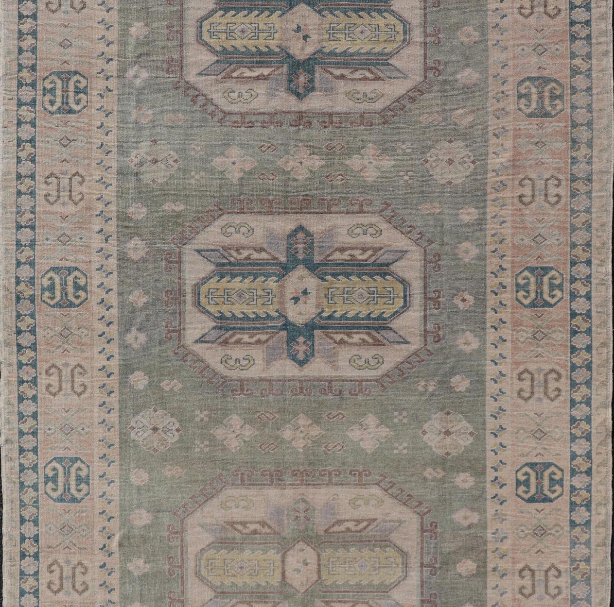 Measures: 6'0 x 9'10 Turkish Vintage Tribal Medallion Oushak in Muted Green, Blue, and Cream. Country of Origin: Turkey; Type: Oushak; Design: Medallion, Tribal Medallion, All - Over, Tribal; Keivan Woven Arts; rug TU - MTU - 991. mid - 20th century. ... - Keivan Woven ArtsTU - MTU - 991 - 21991Rug