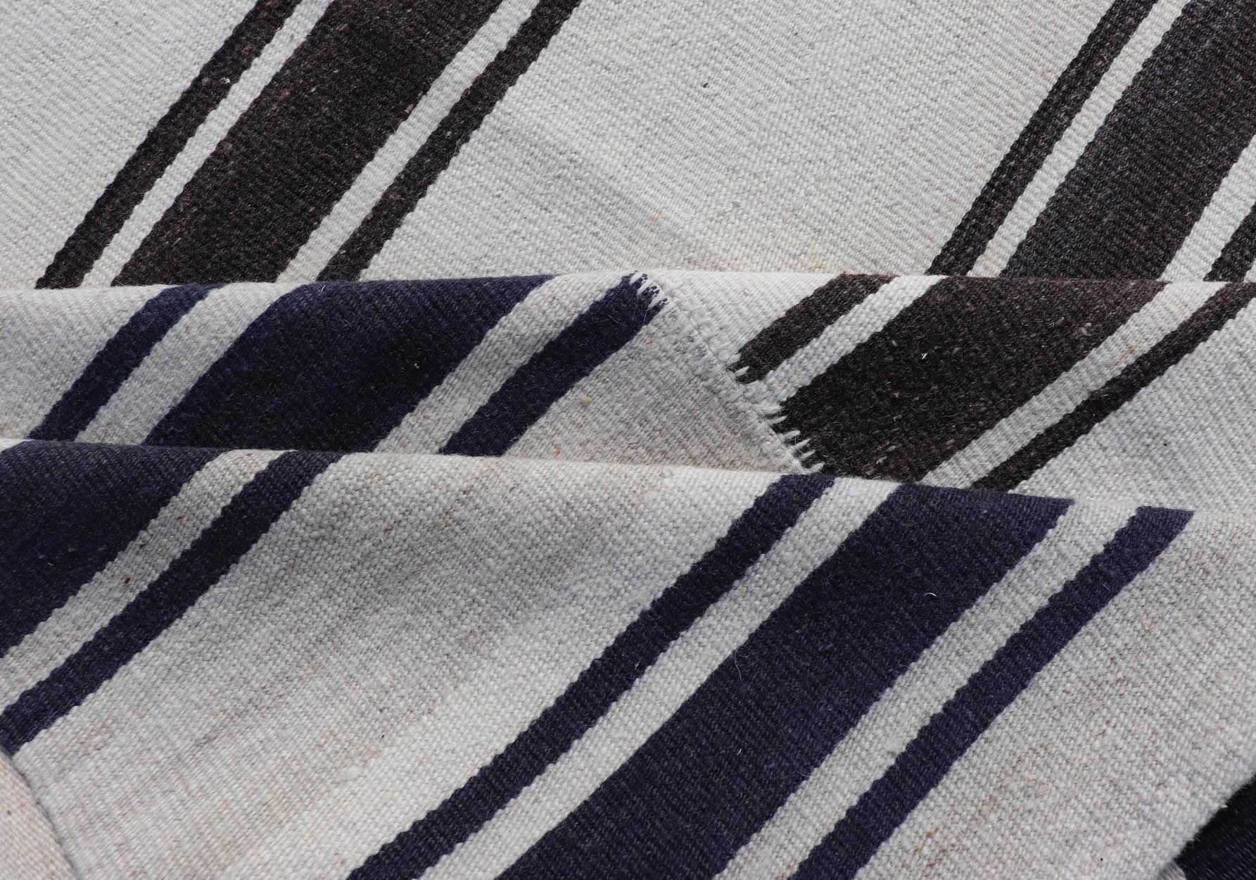 Multi paneled Vintage Turkish Stripe Kilim in Off White, Black, Brown & Dark Blue. Multi paneled Flat - weave vintage Turkish Kilim with vertical stripes in off white background with dark blue, charcoal, Brown and black colors. Keivan Woven Arts - ... - Keivan Woven ArtsTU - NED - 1002 - 14552Rug