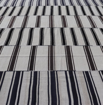 Multi paneled Vintage Turkish Stripe Kilim in Off White, Black, Brown & Dark Blue. Multi paneled Flat - weave vintage Turkish Kilim with vertical stripes in off white background with dark blue, charcoal, Brown and black colors. Keivan Woven Arts - ... - Keivan Woven ArtsTU - NED - 1002 - 14552Rug