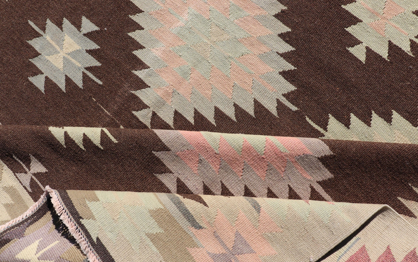 Tribal and Geometrics Turkish Kilim in brown with Cream, Pink, light gray/Blue. Turkish Kilim vintage in dark brown background and cream with graphic tribal design, Keivan Woven Arts rug/TU - NED - 1009, country of origin / type: Turkey / Kilim, ci... - Keivan Woven ArtsTU - NED - 1009 - 14318Rug