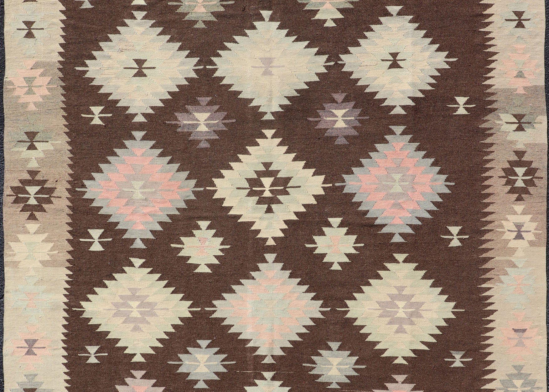 Tribal and Geometrics Turkish Kilim in brown with Cream, Pink, light gray/Blue. Turkish Kilim vintage in dark brown background and cream with graphic tribal design, Keivan Woven Arts rug/TU - NED - 1009, country of origin / type: Turkey / Kilim, ci... - Keivan Woven ArtsTU - NED - 1009 - 14318Rug