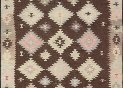 Tribal and Geometrics Turkish Kilim in brown with Cream, Pink, light gray/Blue. Turkish Kilim vintage in dark brown background and cream with graphic tribal design, Keivan Woven Arts rug/TU - NED - 1009, country of origin / type: Turkey / Kilim, ci... - Keivan Woven ArtsTU - NED - 1009 - 14318Rug