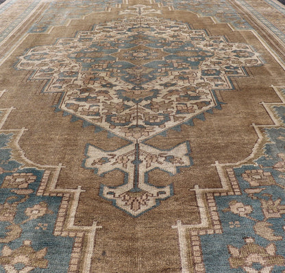 Turkish Oushak Vintage Carpet from Turkey in Golden Brown and Blue Tones Vintage Oushak carpet from Turkey in blue and golden tones, rug TU - NED - 1029, country of origin / type: Turkey / Oushak, circa 1950 This vintage Turkish Oushak rug fe... - Keivan Woven ArtsTU - NED - 1029 - 14396Rug