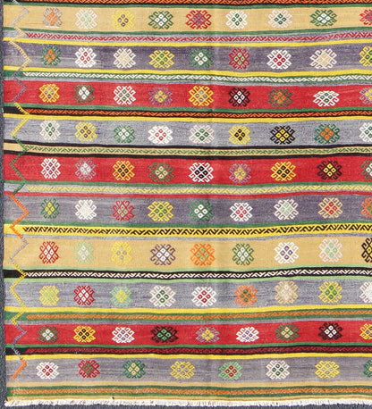 Colorful Large Turkish Kilim Carpet with Striped Geometric Shapes Design Turkish Kilim Carpet with Striped Geometric Shapes Design. Keivan Woven Arts / rug/TU - NED - 103 origin/turkey mid - 20th Century. Featuring tribal shapes with a spo... - Keivan Woven ArtsTU - NED - 103 - 3514Rug