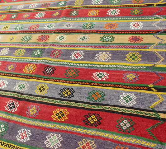 Colorful Large Turkish Kilim Carpet with Striped Geometric Shapes Design Turkish Kilim Carpet with Striped Geometric Shapes Design. Keivan Woven Arts / rug/TU - NED - 103 origin/turkey mid - 20th Century. Featuring tribal shapes with a spo... - Keivan Woven ArtsTU - NED - 103 - 3514Rug