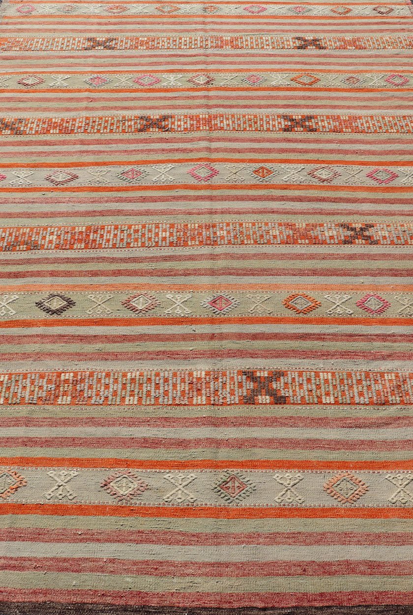 Vintage Turkish Kilim with with Embroideries in Colorful Stripes including Orange, Lt. green, red & gray, charcoal and teal blue. Measures:6'8 x 11'4 Vintage Turkish Kilim rug with geometric shapes and colorful stripes. Keivan Woven Arts / rug TU... - Keivan Woven ArtsTU - NED - 1030 - 14330Rug