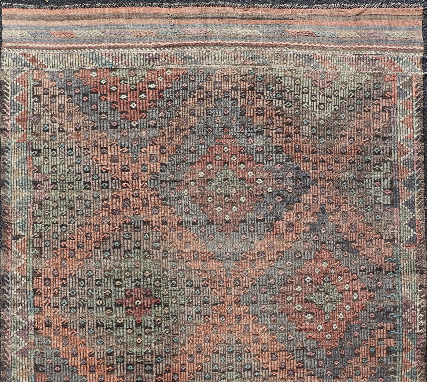 Softly Colored Turkish Vintage Embroidered Kilim Rug With Multi Layered Diamond. Turkish Vintage Embroidered Flat Weave Rug With Tribal multi layered Diamond design and medium color tones in Gray, Blue, Green, light Tangerine and cream colors, ... - Keivan Woven ArtsTU - NED - 1032 - 14336Rug
