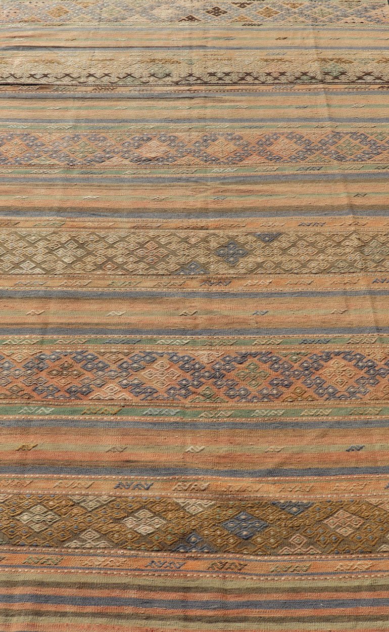 Vintage Striped Turkish Kilim Rug with Geometric Shapes and Soft Muted Colors. Vintage Turkish Kilim rug with geometric shapes and colorful stripes. Keivan Woven Arts / rug TU - NED - 1038, country of origin / type: turkey / Kilim, circa mid - 20th ce... - Keivan Woven ArtsTU - NED - 1038 - 14356Rug
