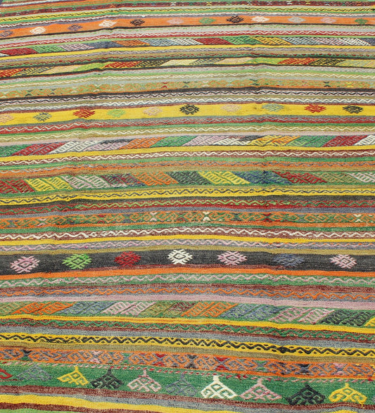 Vintage Turkish Kilim Rug with Colorful Stripe and Diamond Motif Designs. Keivan Woven Arts / rug /TU - NED - 105, country of origin / type: Turkey / Kilim, circa 1950's Measures: 6'1 x 9'1. This exciting and colorful striped vintage Kilim from 1950... - Keivan Woven ArtsTU - NED - 105 - 3520Rug