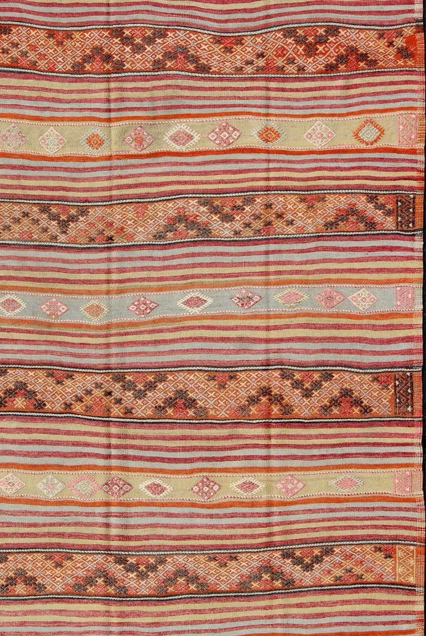 Turkish Kilim Vintage Rug with Assorted Stripe Design in a Variety of Colors Vintage Turkish Kilim Rug, rug TU - NED - 110, country of origin / type: Turkey / Kilim, circa Mid - 20th century Measures: 6'5 x 11'5. Featuring a repeating ho... - Keivan Woven ArtsTU - NED - 110 - 3532Rug