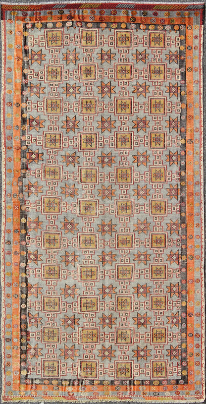 Long Kilim rug geometric vintage Turkish Kilim rug with colorful all - over star design. Keivan Woven Arts / rug TU - NED - 1111, country of origin / type: Turkey / Oushak, circa 1950 Featuring an all - over design of stars and boxes with a spotted and ... - Keivan Woven ArtsTU - NED - 1111 - 9182Rug