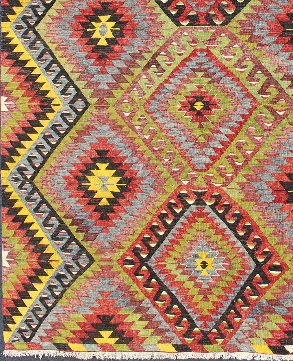 Vintage Turkish Kilim with Diamond Design in Brilliant Multi Colors. Measures: 5'8 x 8'11. This colorful Turkish Kilim boasts a repeating diamond pattern in vivid greens, yellows and reds, giving it a very modern look, perfect for modern and cas... - Keivan Woven ArtsTU - NED - 114 - 3536Rug